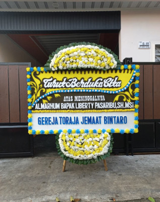 Papan Bunga Duka di Partihaman Saroha